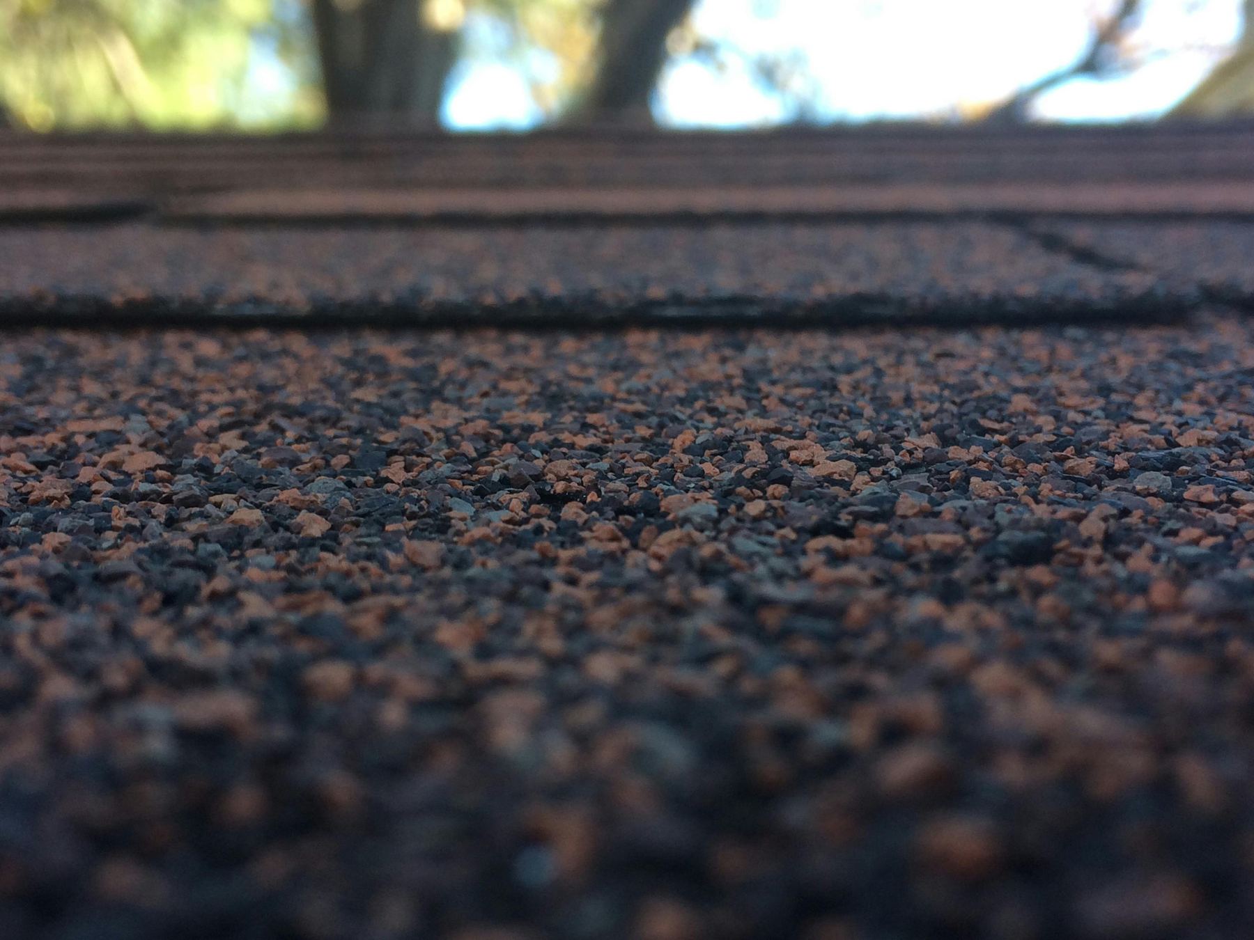 Macro close-up of asphalt shingle granules